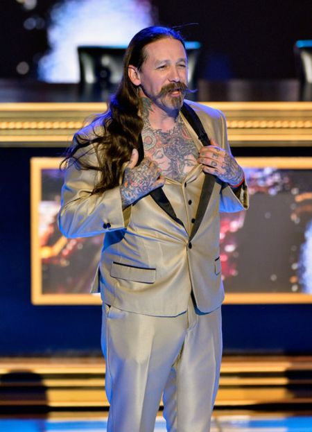 Oliver is also owner of tattoo shops Elm Street Tattoo and True Tattoo.