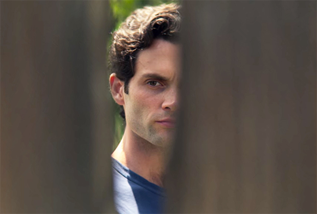 joe peeping from in between the fence