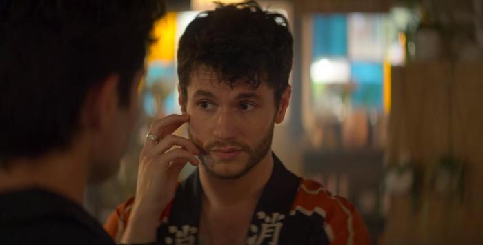 james wearing a japanese robe standing infront of joe 