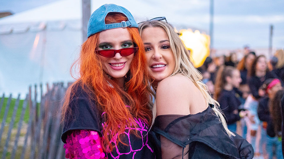 bella and tana hugging posing for the camera on coachella