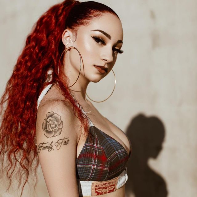 bergoli showing her family first tattoo on her left arm 