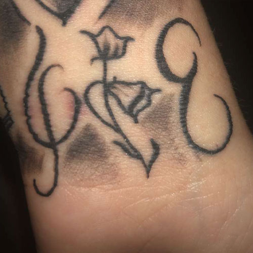 the rappers initials DB encase a flower 