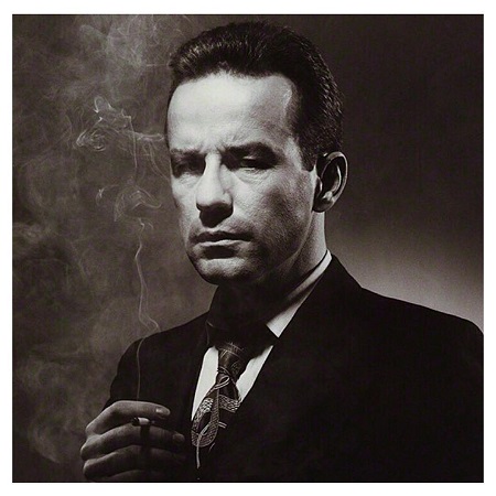 Phil Hartman in a black & white photo.