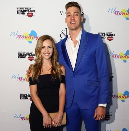 Elle is a businesswoman who also manages her husband, Leonard brand.