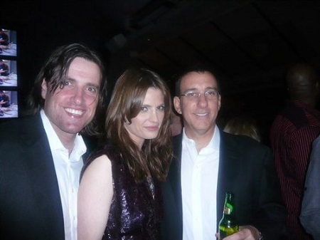 Stana Katic, husband Kris Brkljac and an unknown person At Greg Lauren Presents: Alteration Los Angeles Party, May 2010.