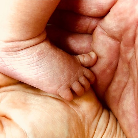 America Ferrera's post showing her baby's legs during the birth announcement.