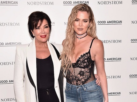 Khloé Kardashian with her mother Kris Jenner during a Nordstrom X Good American red carpet event.