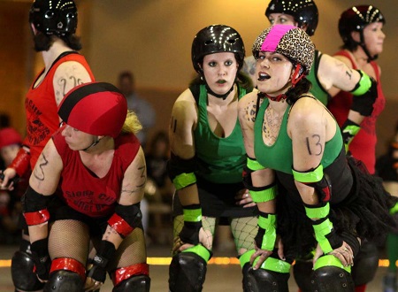 Danielle Colby and her friends during a roller derby warmup.