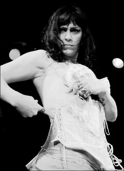 Danielle Colby in midst of a burlesque performance.