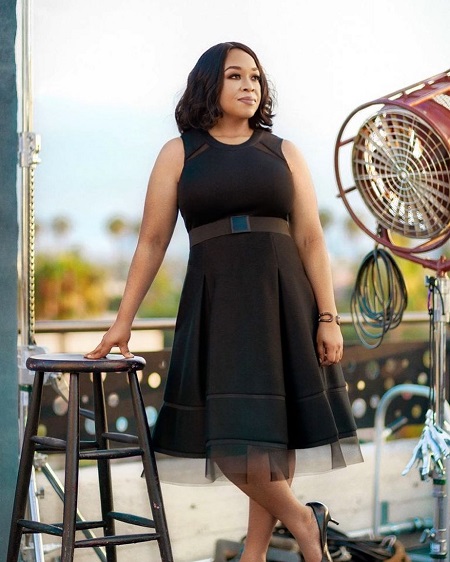 Shonda Rhimes in a black gown.