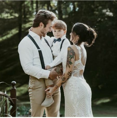 Peyton Meyer and Taela with their baby boy.