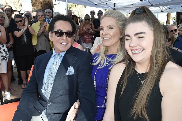 Wayne newton, his second daughter and Kathleen laughing in photo