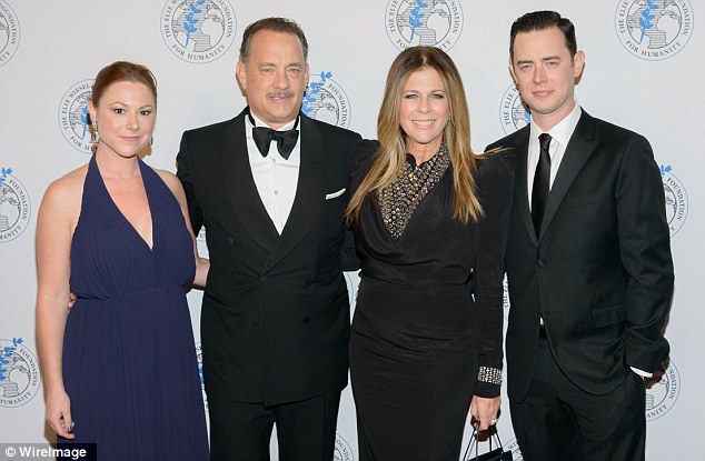 Wilson standing as pose with tom and his children from previous wife