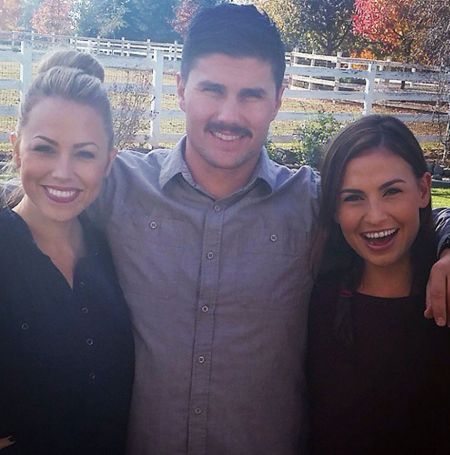 Joshua Hall with his two younger sisters.