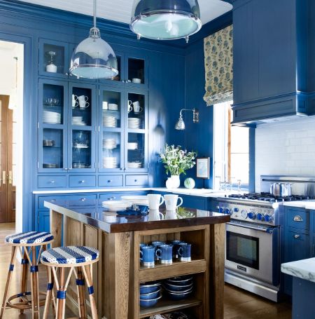 A kitchen’s French doors open onto the property’s main terrace.