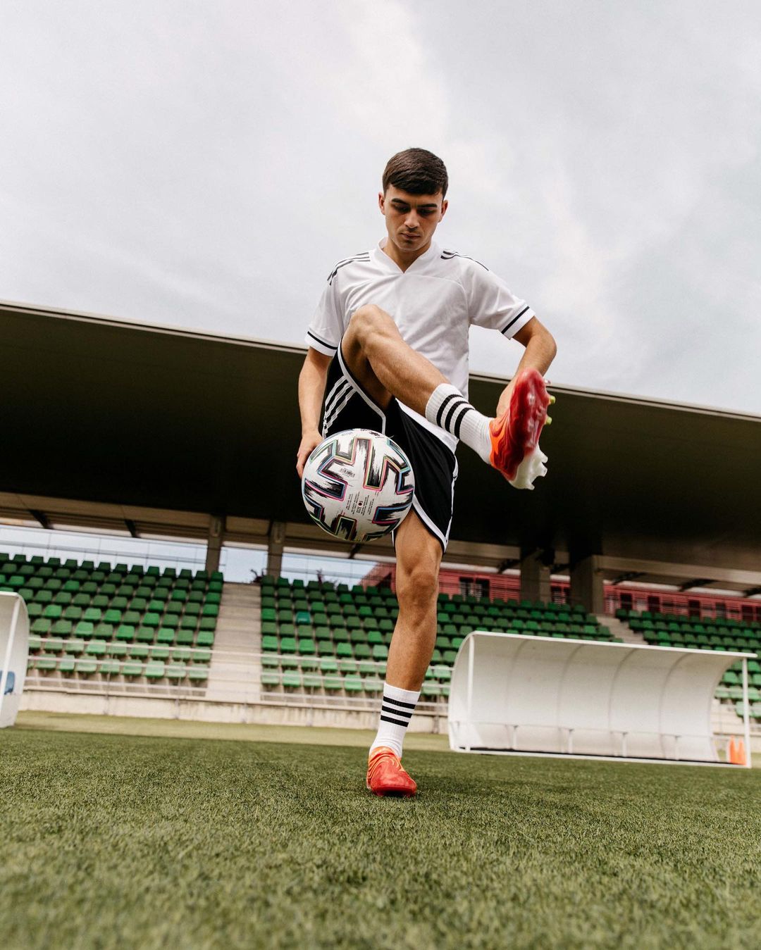 Pedri is posing for his photoshoot.