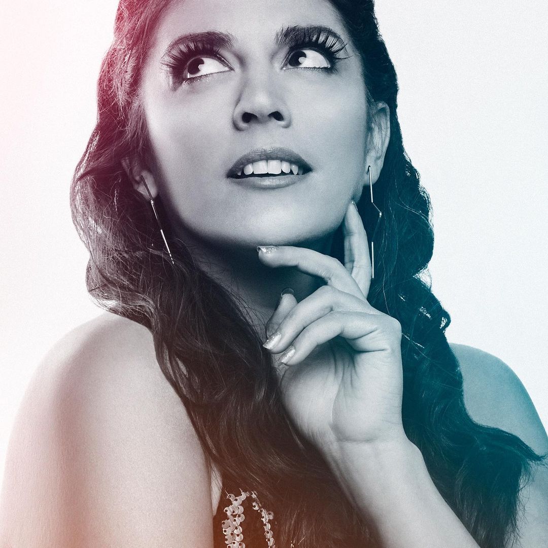 Cecily Strong posing for her photoshoot.