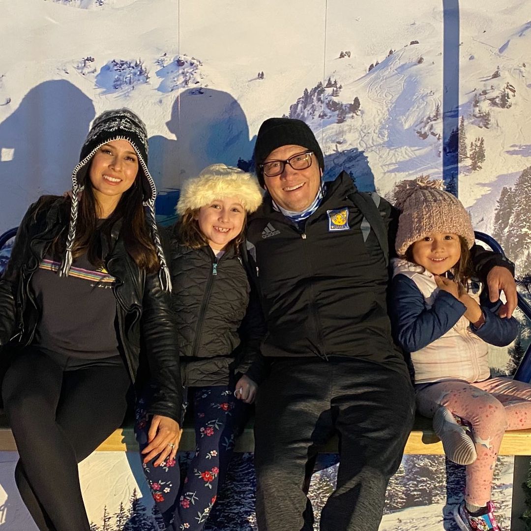 Patricia Azarcoya Schneider is with her husband and daughter..