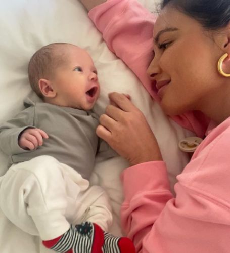 John Mulaney&nbsp;and Olivia Munn have revealed the first photo of their one-month-old child. 
