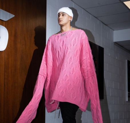Kyle is roasted for wearing an oversized pink sweater.Photo Source: Instagram