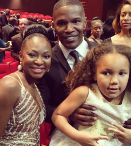 Annalise Bishop with her father, Jamie Foxx, alongside Naturi Naughton.