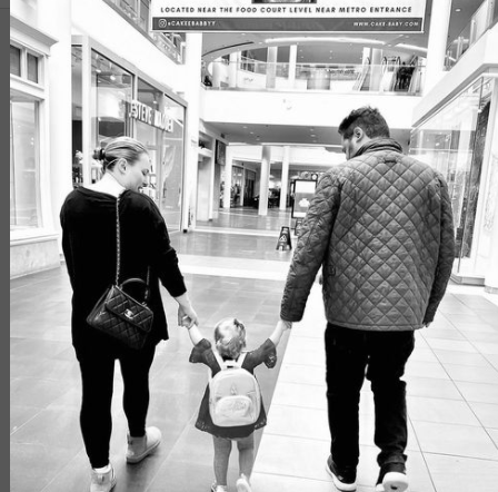 Meghan McCain with her husband and baby daughter.