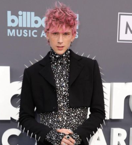  Machine Gun Kelly was touched by a fan at the Moda Center in Portland, Oregon.